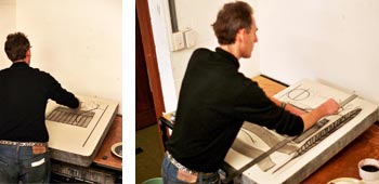photos of simon ogden drawing his stone